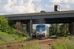 AMTK 204 rounds the curve and ducks under the Interstate leading an oversized #7